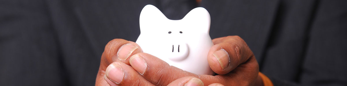 Man holding piggybank